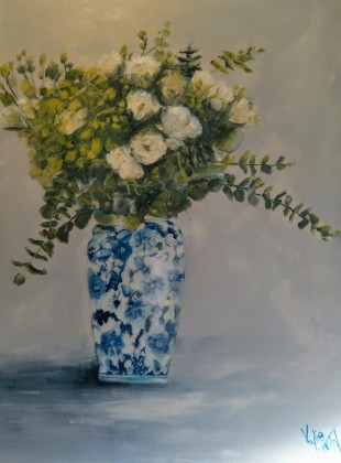 flowers in blue and white vase